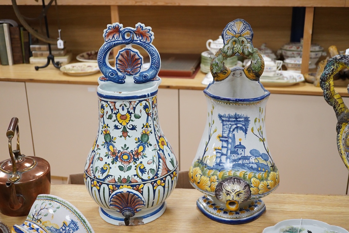 Two French faience large water wall cisterns, a wall pocket and wall bracket, largest 58cm high